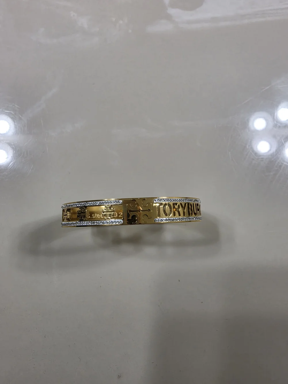 Tory Burch Gold-Tone Logo Crystal Bangle